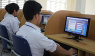 Học sinh thi kiến thức Excel trên máy tính